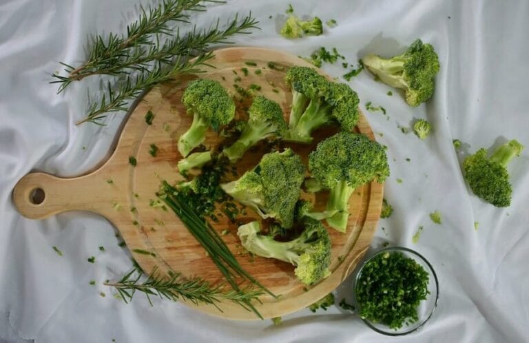 broccoli florets on chopping board