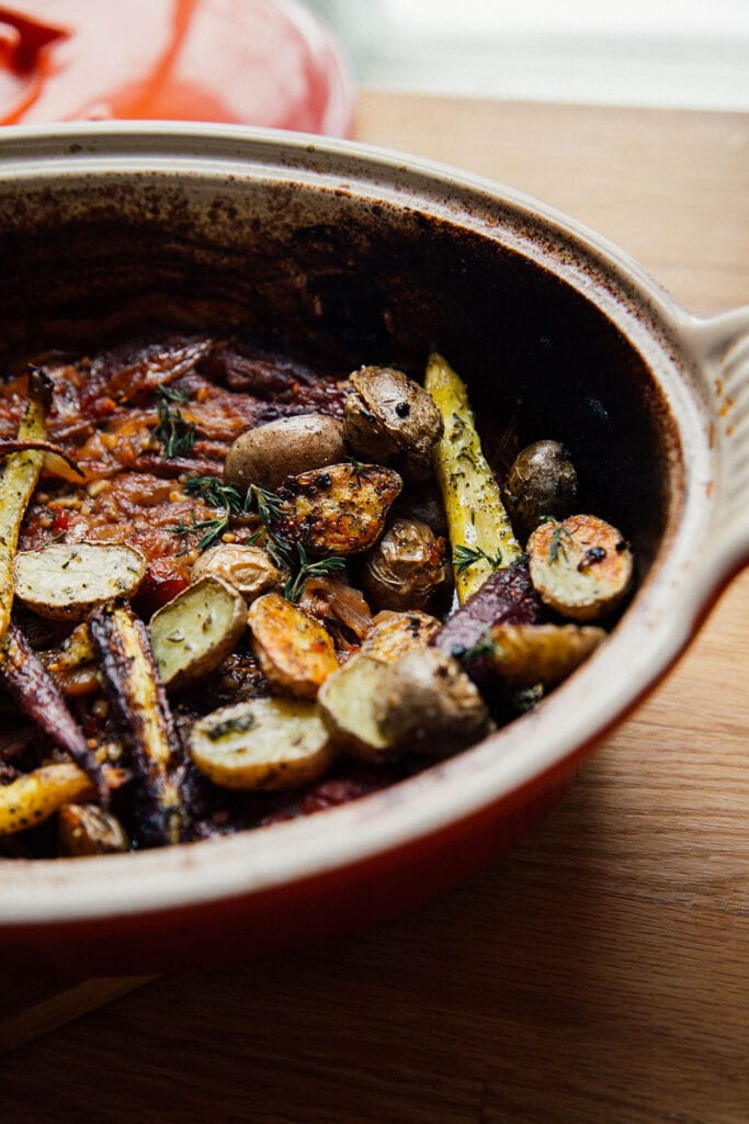 oven roasted carrots and potatoes in pan